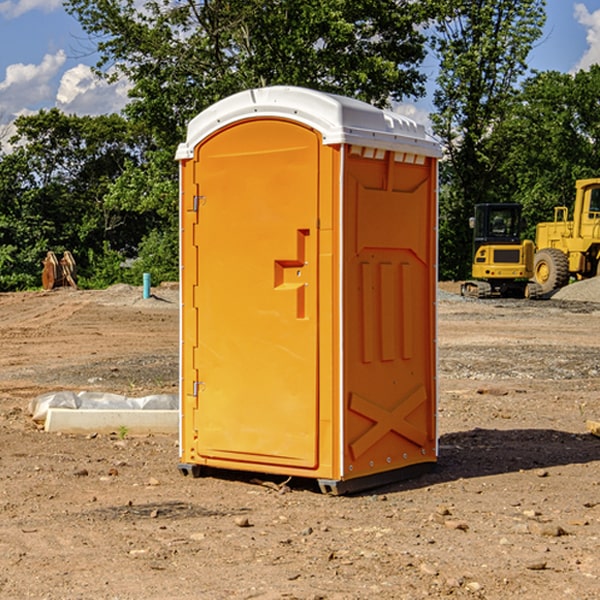 how often are the portable restrooms cleaned and serviced during a rental period in Cotter IA